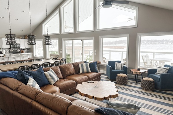 Lake Life's great room features floor to ceiling windows that overlook Jimmerson Lake