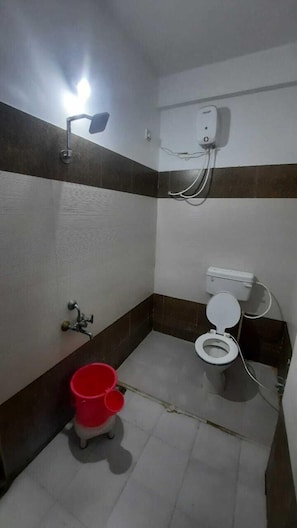 Shower, rainfall showerhead, bidet, towels - Hotel S M INN near Temple & Main Places (Ujjain)