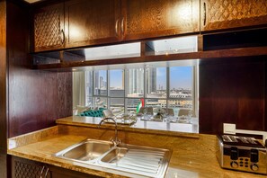 Fridge, microwave, stovetop, dishwasher - Durrani Homes -Lavish 3BR Besides Burj Khalifa (Dubai)