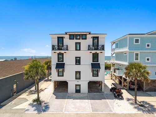 Experience luxury at 'How Suite It Is'—14-bedroom oceanfront retreat in Oak Island!