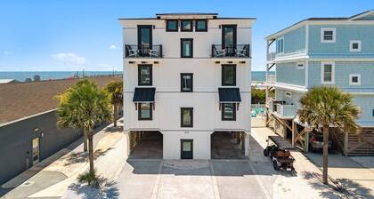 Experience luxury at 'How Suite It Is'—14-bedroom oceanfront retreat in Oak Island!
