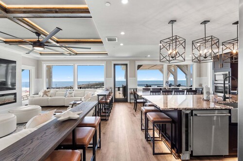 Experience luxury at 'How Suite It Is'—14-bedroom oceanfront retreat in Oak Island!