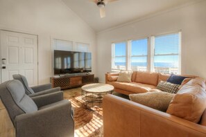 Smart TV - The Pink Pelican: Oceanfront 4BR house in Oak Island, perfect for family escapes. (Oak Island)
