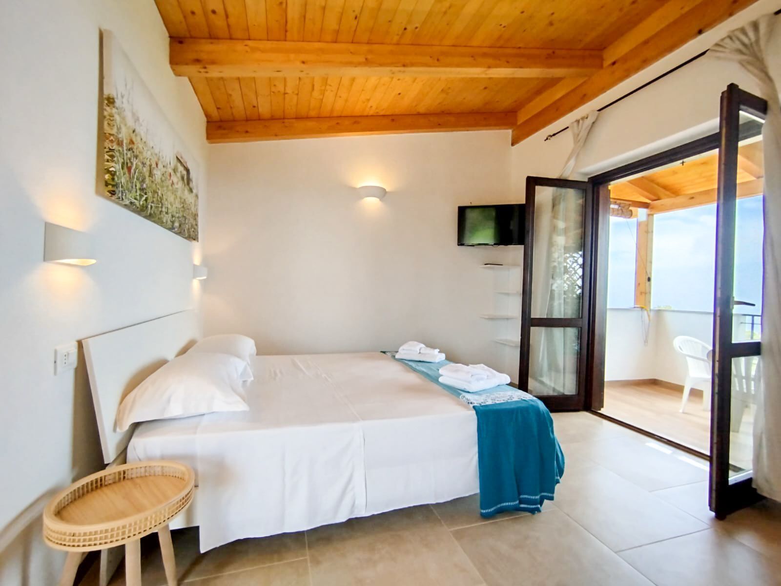 Habitación doble, vistas al mar | Tabla de planchar con plancha y wifi gratis