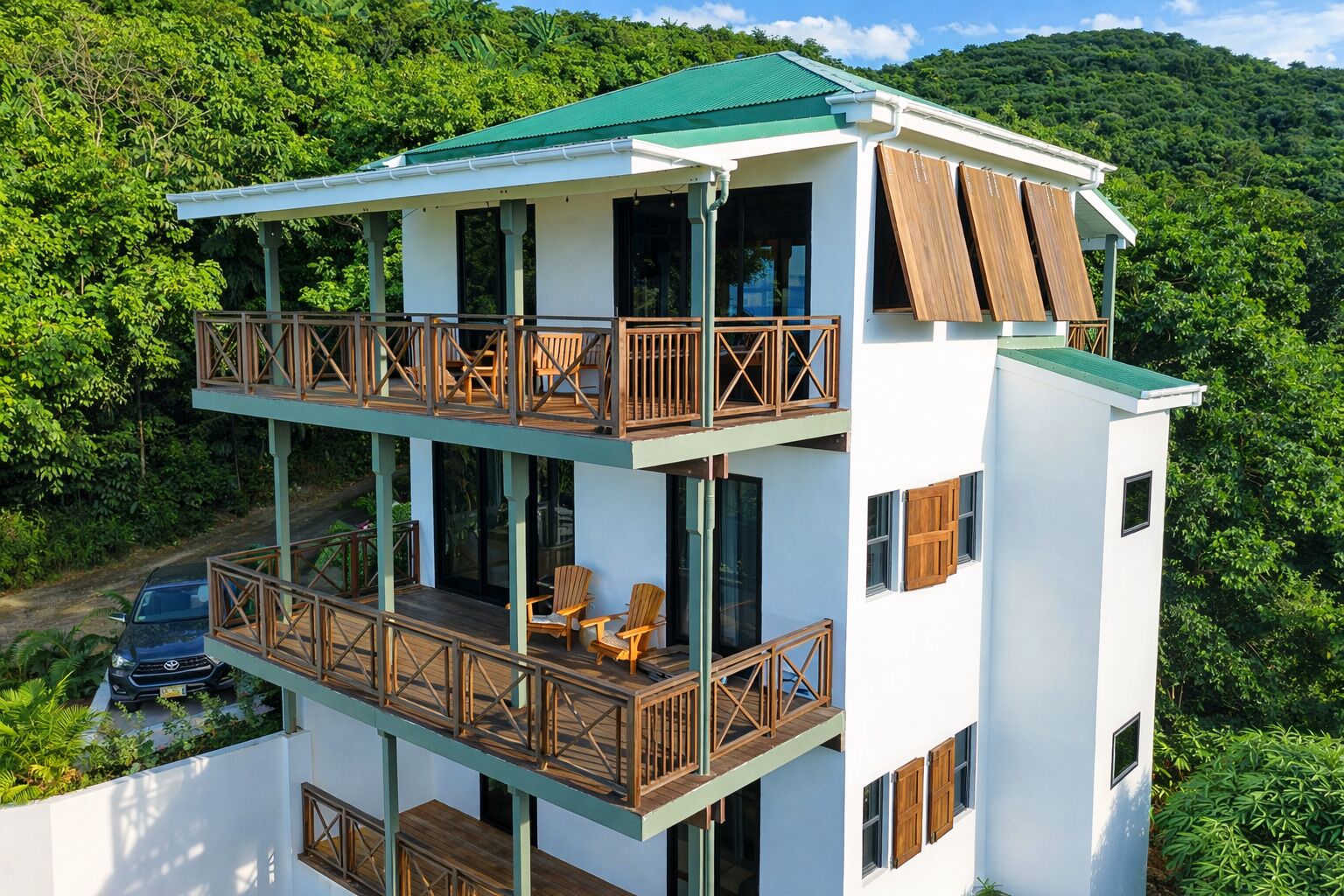 A boutique villa with ocean views nestled in the private estate of Green Bank.