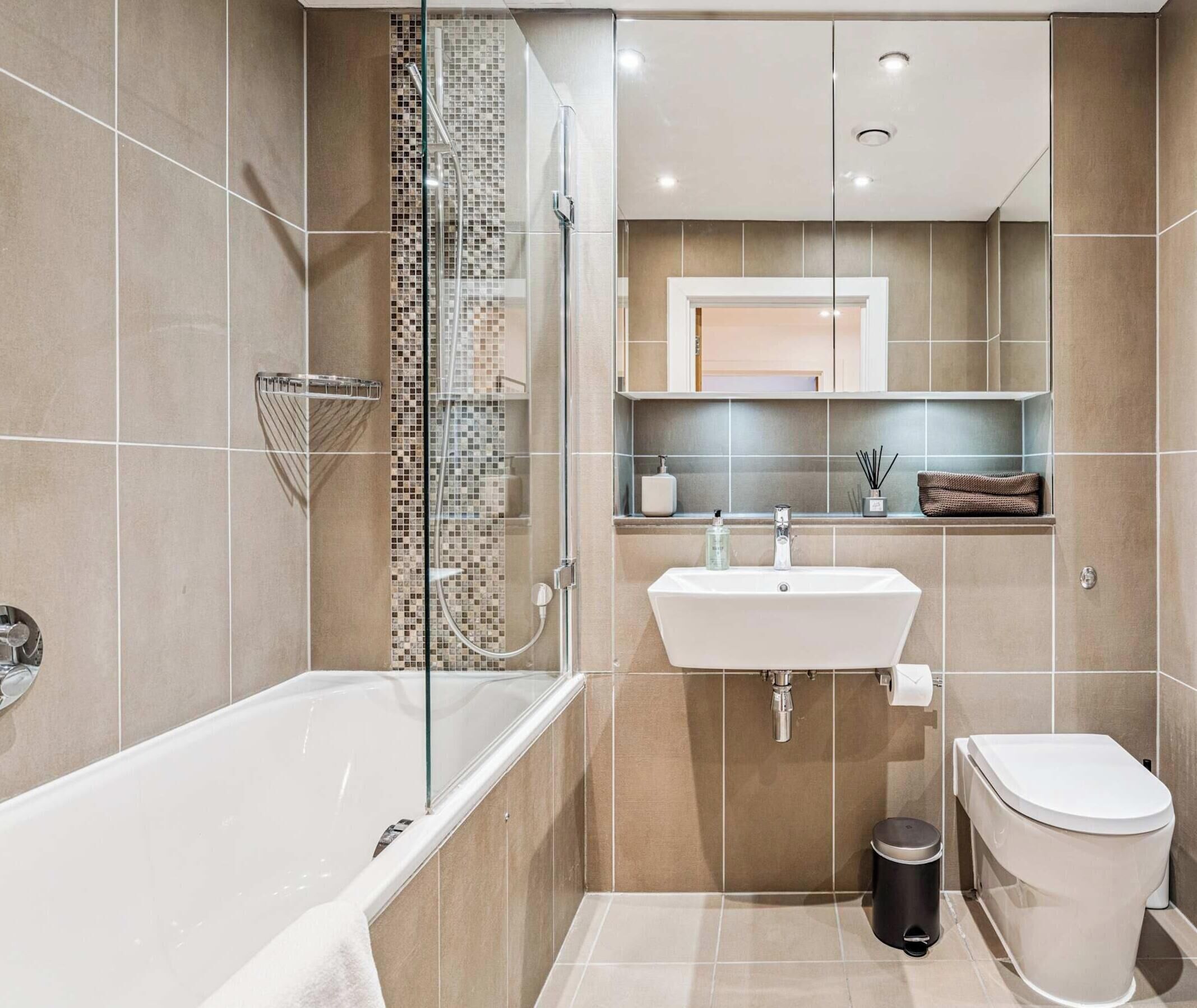 Shower, hair dryer, towels, shampoo