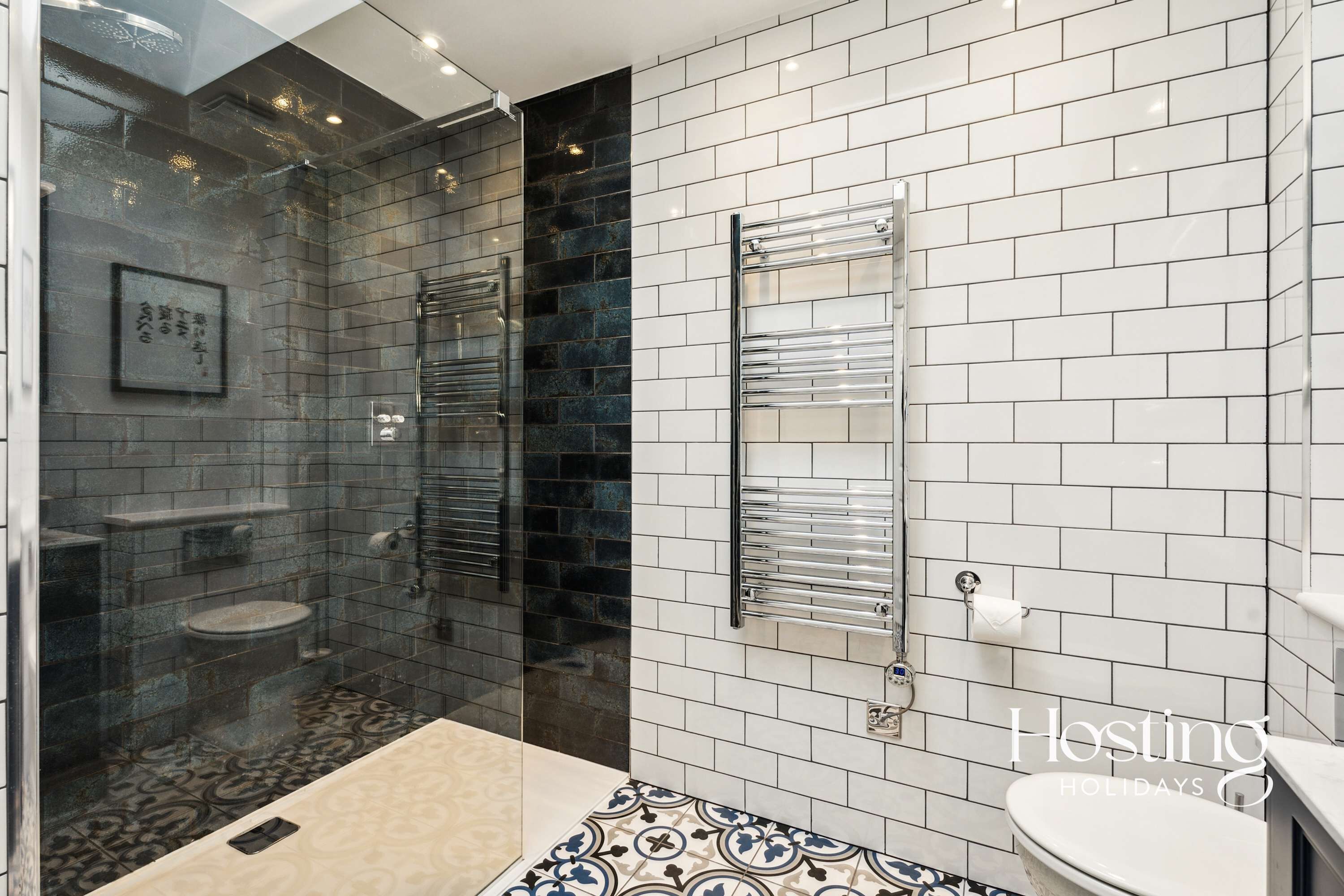 Shower, hair dryer, towels, shampoo