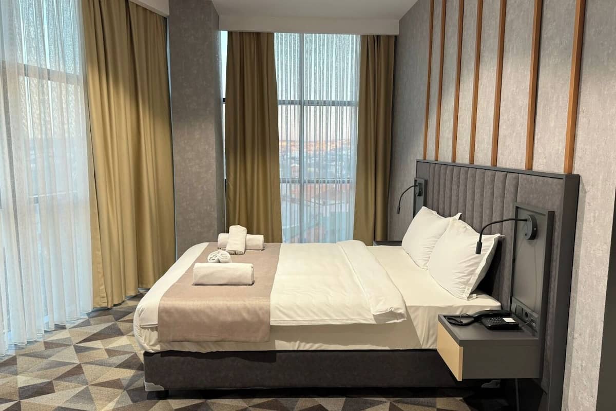 Habitación individual, vista a la ciudad | Ropa de cama de alta calidad, camas Select Comfort y minibar