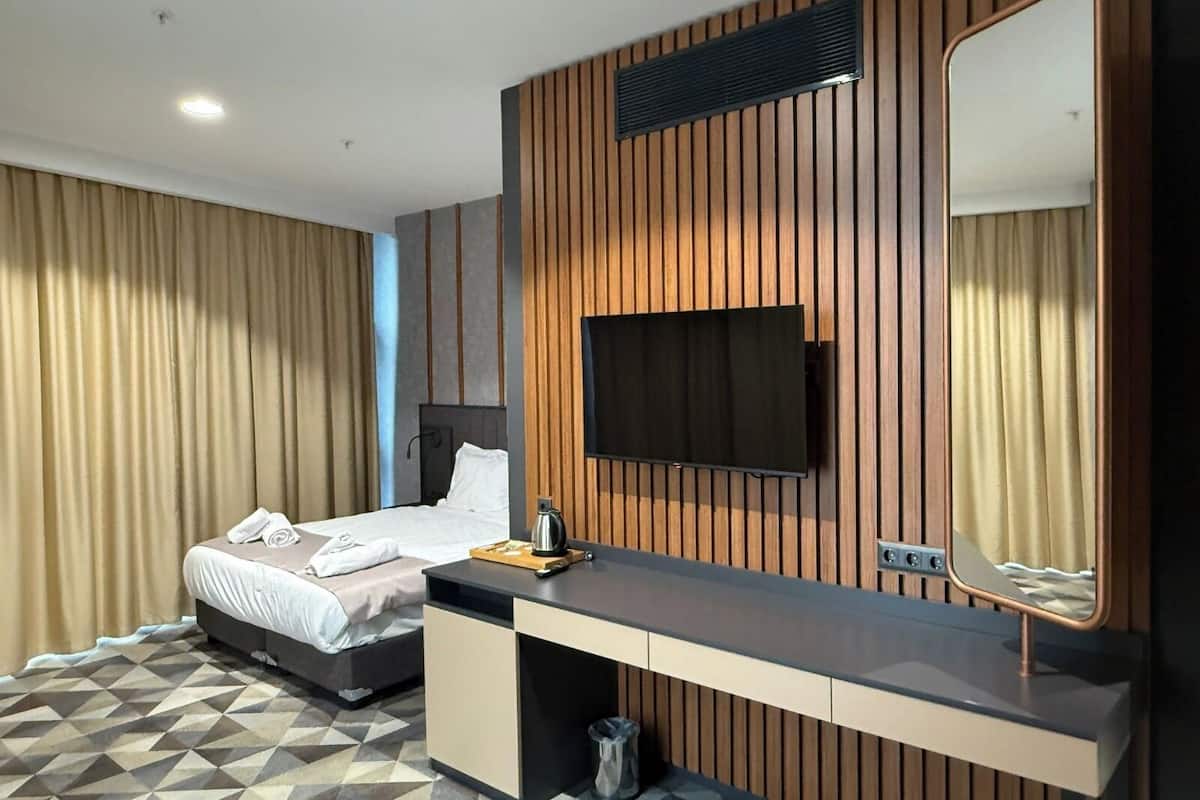 Ropa de cama de alta calidad, colchones Select Comfort y minibar