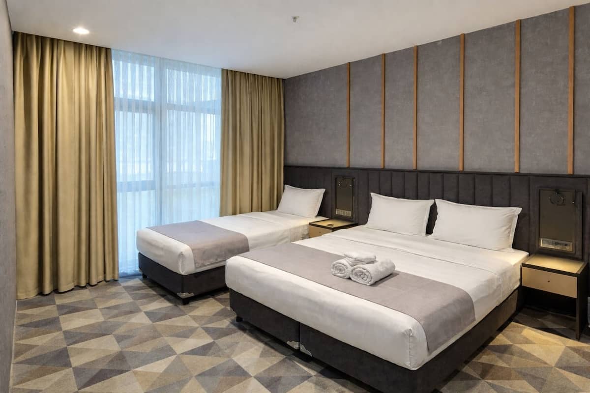 Triple Room | Premium bedding, Select Comfort beds, minibar, in-room safe