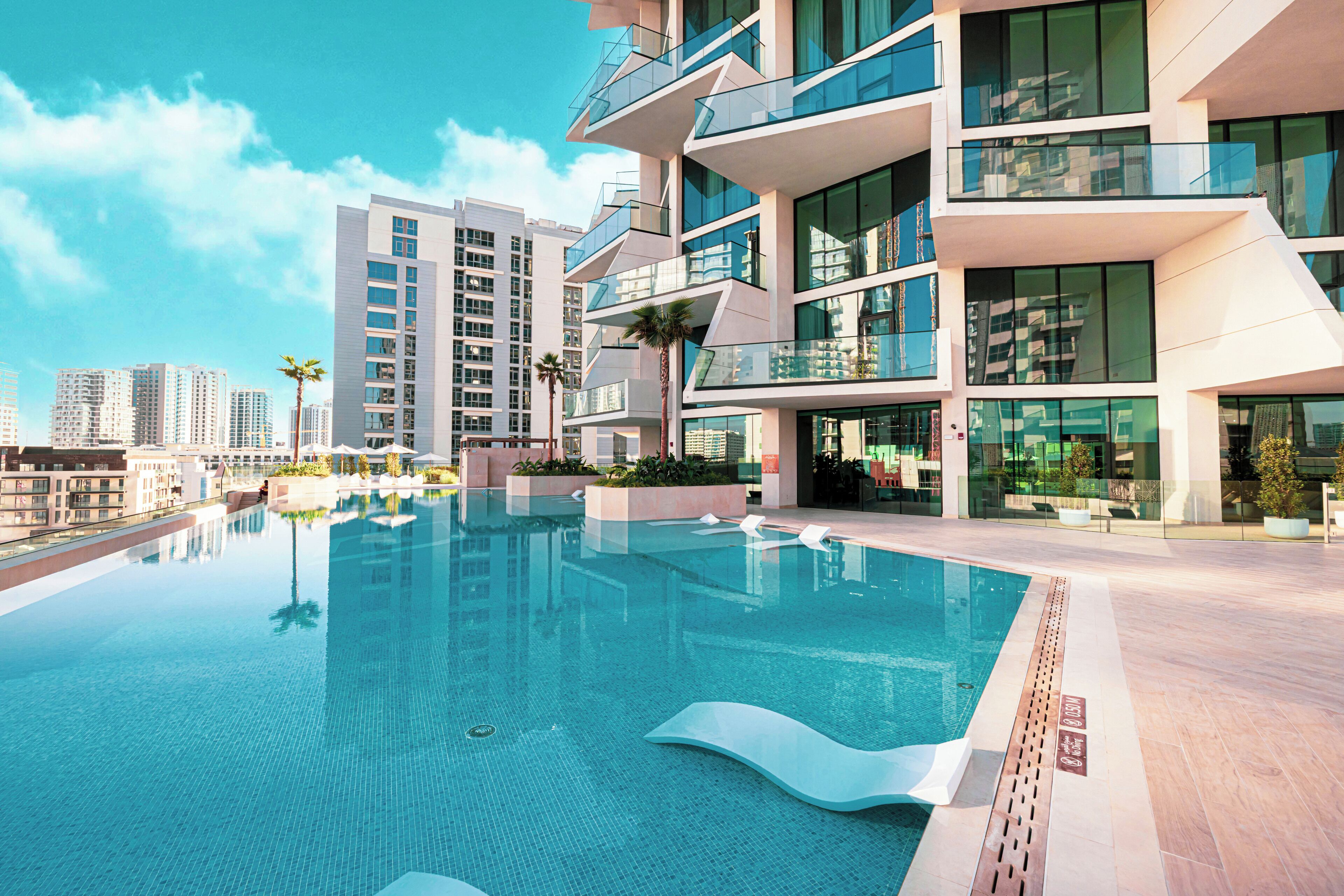 Indoor pool, outdoor pool, open 9:00 AM to 9:00 PM, pool umbrellas