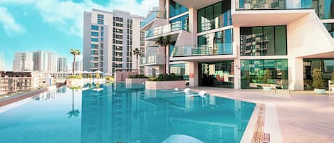 Indoor pool, outdoor pool, open 9:00 AM to 9:00 PM, pool umbrellas