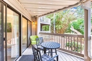 Outdoor dining - Coastal Retreat with Private Balcony & Pool Access (Hilton Head Island)