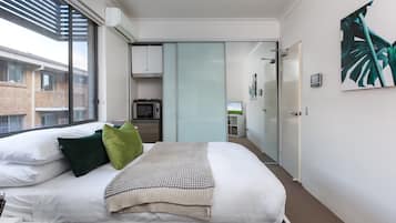 1 bedroom, laptop workspace, iron/ironing board, bed sheets