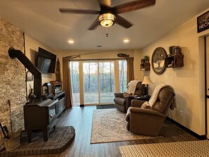 Living area - Luxury creekside cabin near High Falls with views, fire pit & trails nearby (Crivitz)