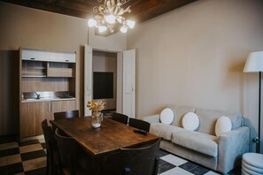 Chambre Quadruple Deluxe, vue jardin | Intérieur