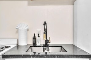 Fridge, microwave, oven, stovetop - Santorini Blu | Elegant 1BR Beach Retreat Steps to Ocean (Hollywood)