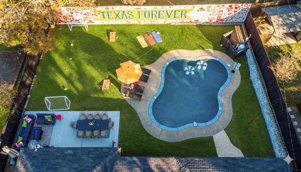 Outdoor pool - Epic Luxury Texas Willow Ranch w/ Pool, Game Room, Soccer, BBQ, Fire table (North Richland Hills)