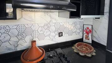 Fridge, microwave, blender, lobster pot