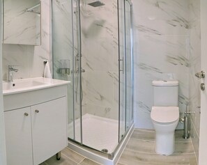 Hair dryer, towels, soap, shampoo