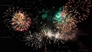 A nighttime scene with fireworks in the sky.