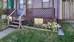 A two-story house with a front porch, a visible number '46', and a small garden area. - Mid-term stay 3BR Furnished House(monthly rental) (Hamilton)