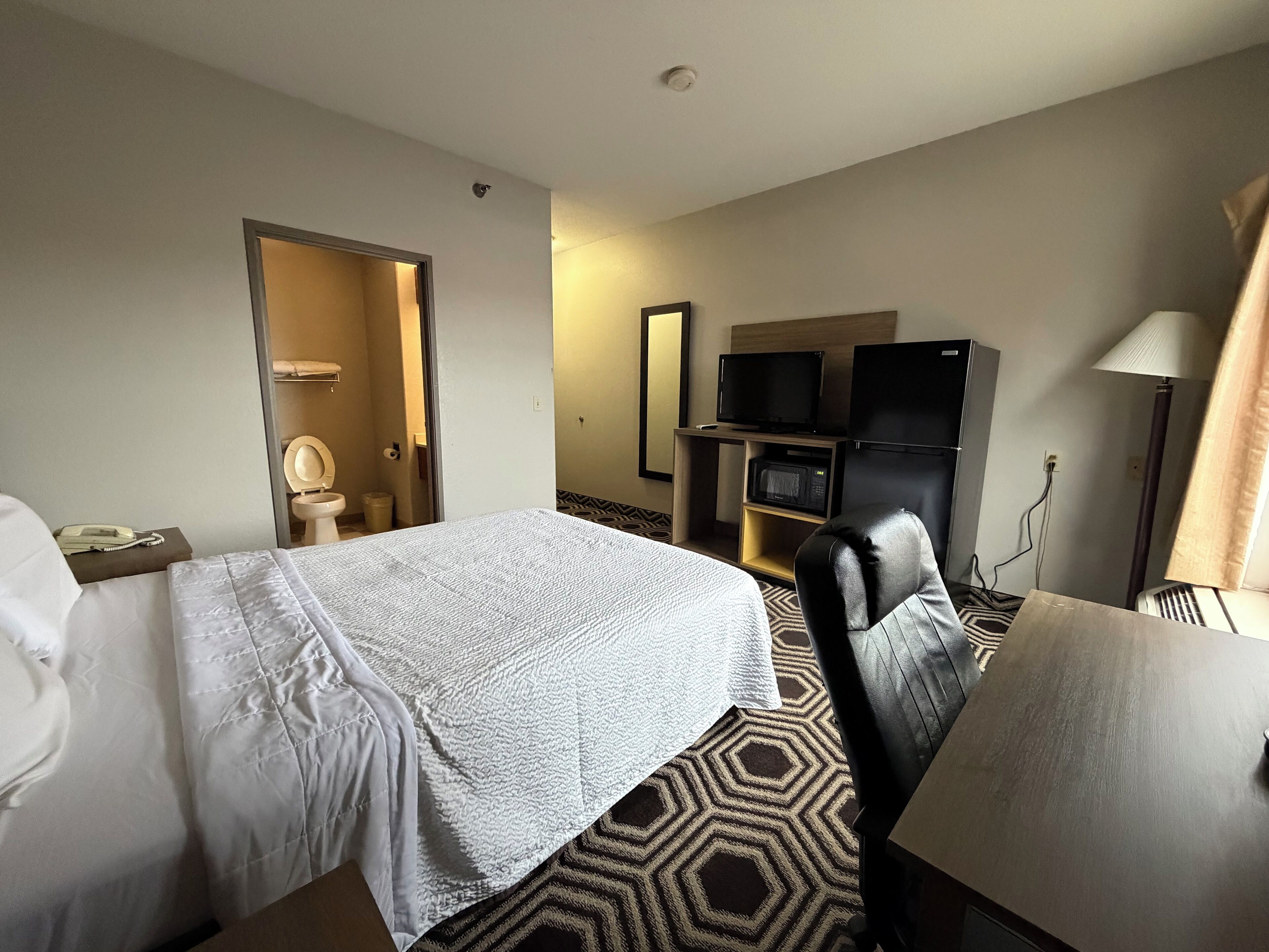 Habitació individual Deluxe, 1 llit de matrimoni, no fumadors | Escriptori, espai de treball apte per a portàtils i wifi gratuïta 