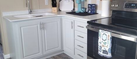 Microondas, horno y parrilla de estufa