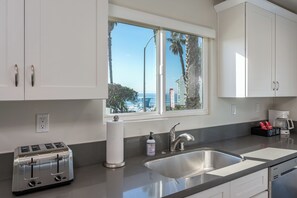 Private kitchen - Steps to the Shore – Entire 7‑Unit Coastal Retreat (Oceanside)