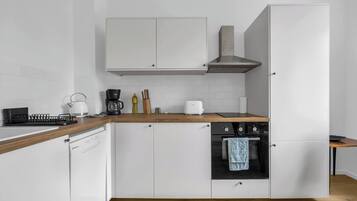 Réfrigérateur, four, plaque de cuisson, lave-vaisselle