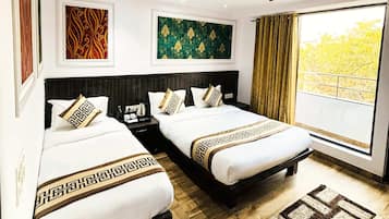 Deluxe Triple Room | Desk, laptop workspace, free WiFi