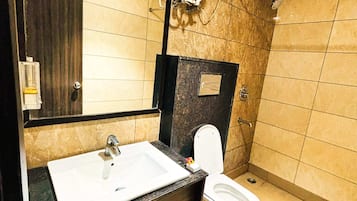 Shower, towels, soap, shampoo