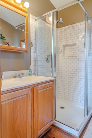 Shower, hair dryer, towels, soap