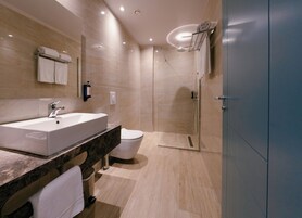 Deluxe Double Room, City View | Bathroom | Shower, free toiletries, hair dryer, bathrobes