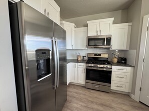 Microwave, oven, stovetop, dishwasher - Western Charm Meets Modern Comfort - 3 Bed, 2.5 Bath Cedar City Townhome. (Cedar City)