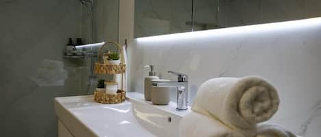 Hair dryer, towels, soap, shampoo