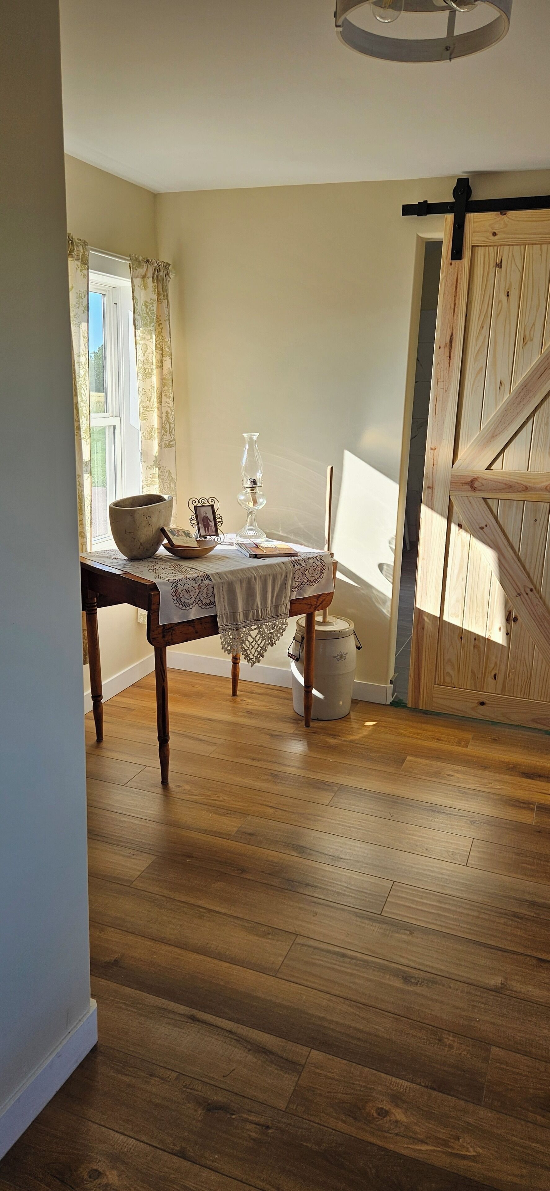 This small pantry table welcomes you in the porch at the back door.