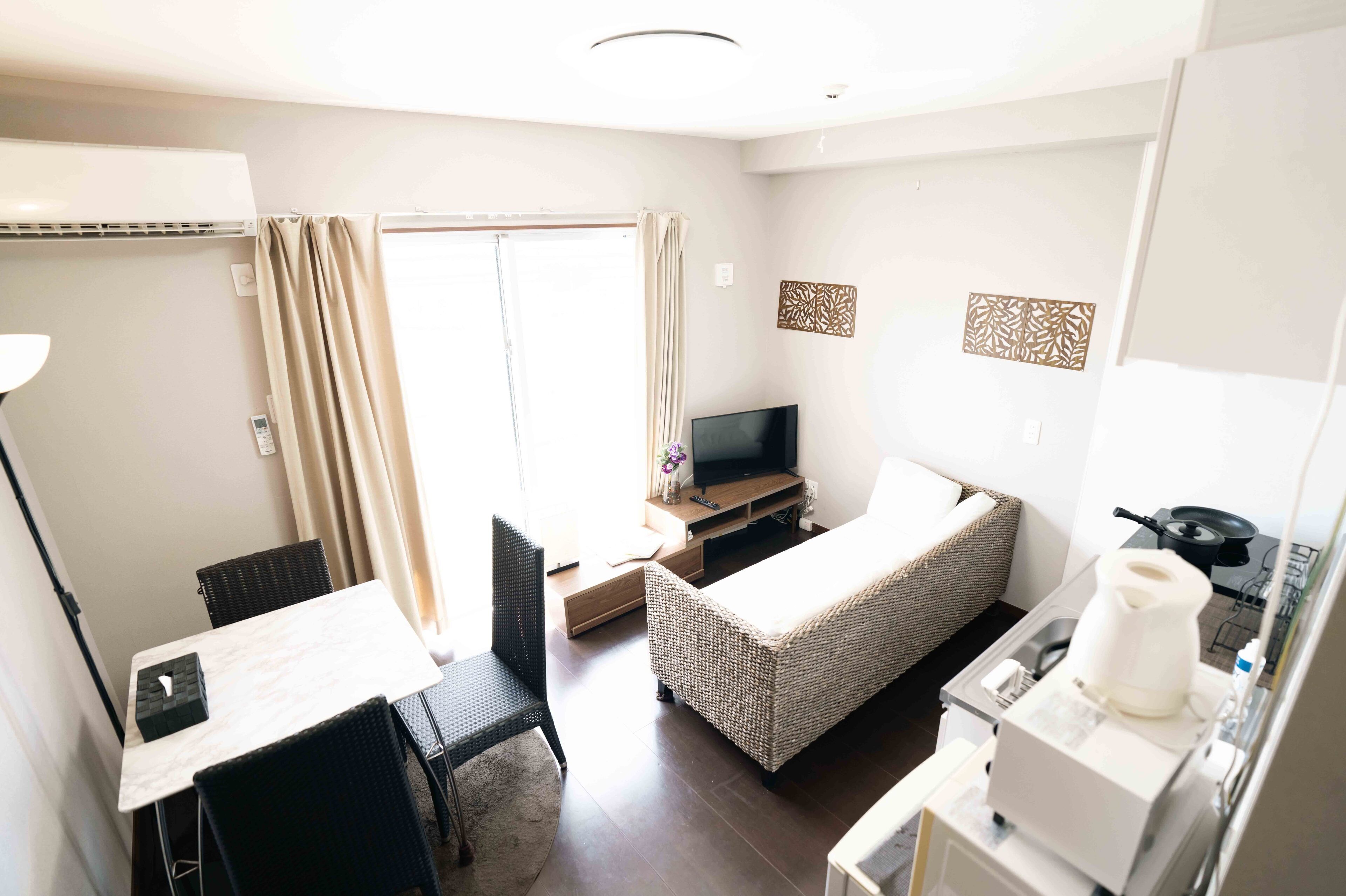 Standard Apartment, Balcony, Partial Ocean View | Living area