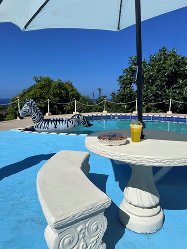 Golden Vibes- Cozy 1-bedroom villa w pool + oceanview St. Mary Parish with AC