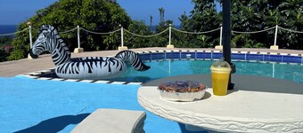 Golden Vibes- Cozy 1-bedroom villa w pool + oceanview St. Mary Parish with AC