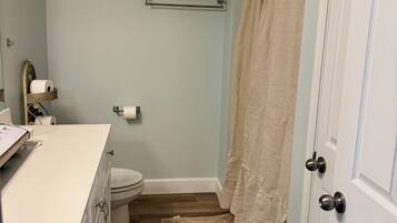 Shower, towels, toilet paper