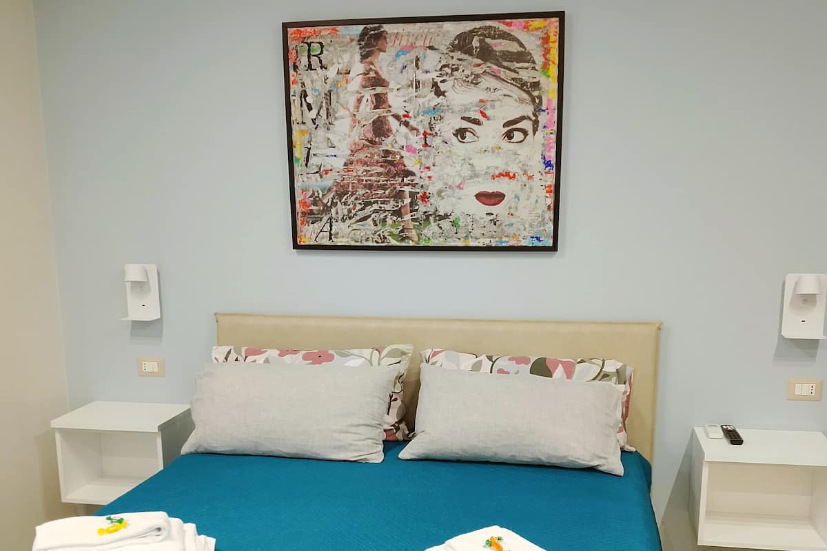 Family Quadruple Room, Balcony | Desk, laptop workspace, free cribs/infant beds, travel crib