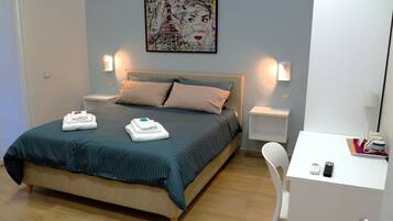 Minibar, desk, laptop workspace, free cots/infant beds