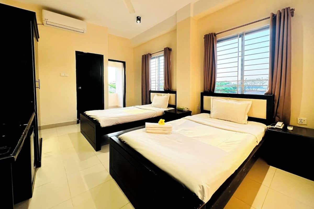 Chambre Prestige double ou avec lits jumeaux | Bureau, accès au Wi-Fi (inclus), literie fournie