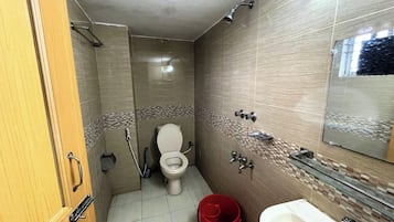 Deluxe Double Room, City View | Bathroom | Bathtub, free toiletries, slippers, towels