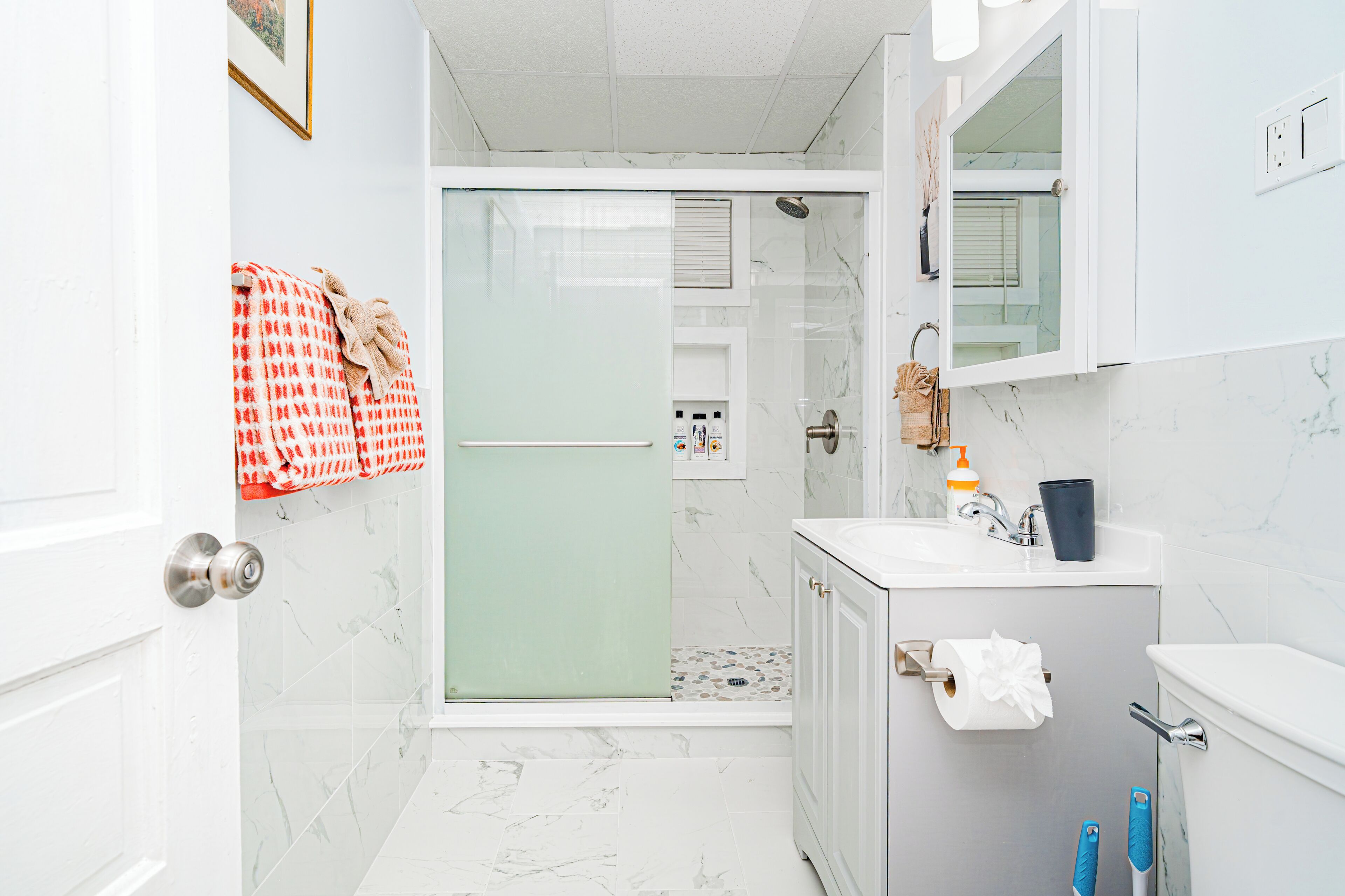 Shower, hair dryer, towels, soap