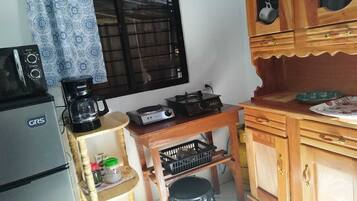 Fridge, microwave, stovetop, coffee/tea maker