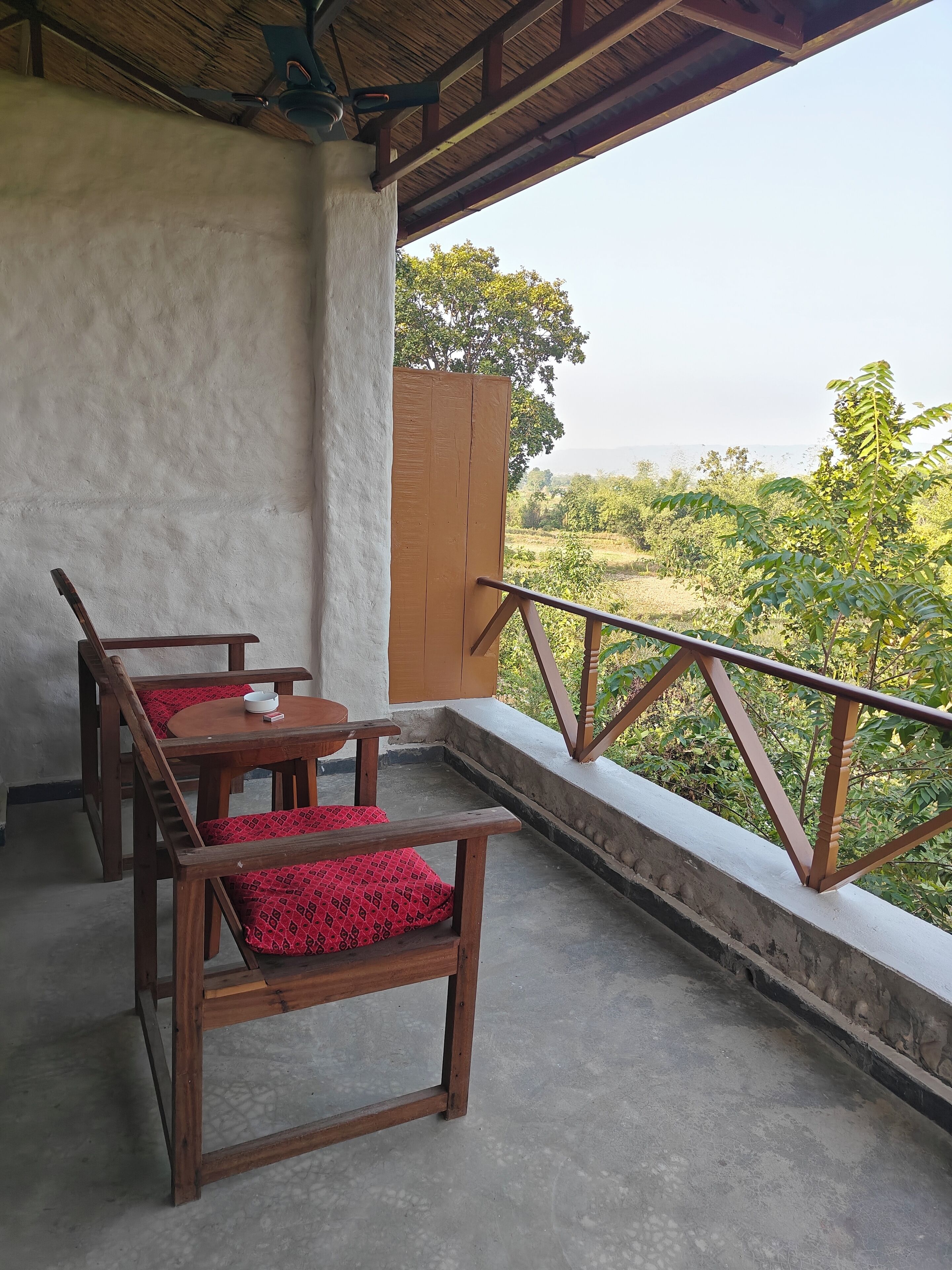 Standard Double Room, Garden View | Balcony view