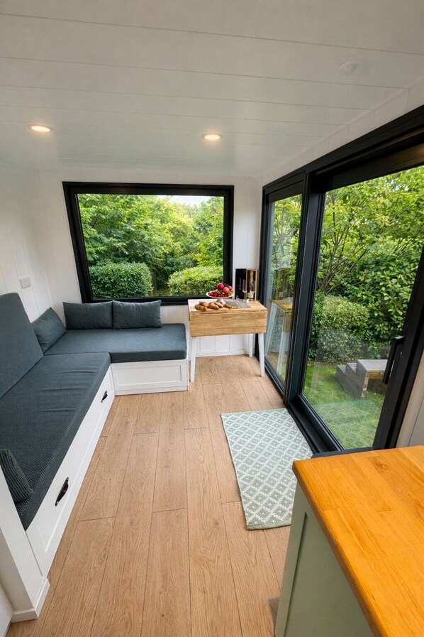 Living area - Old Mill Tiny Homes: Boutique Tiny-Home Stays in Beautiful Surroundings 2 Bed (High Leven)