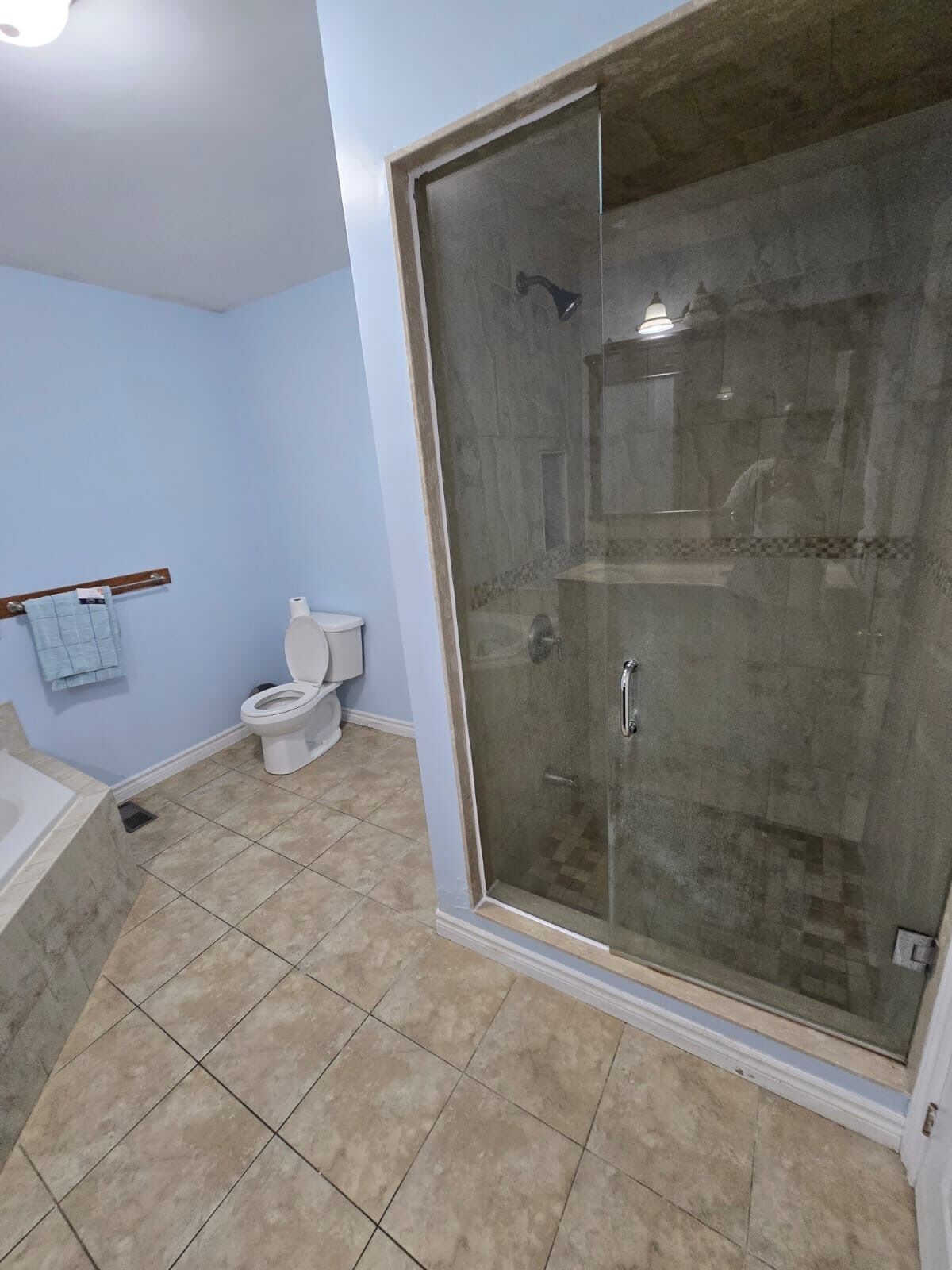 Shower, jetted tub, towels, soap